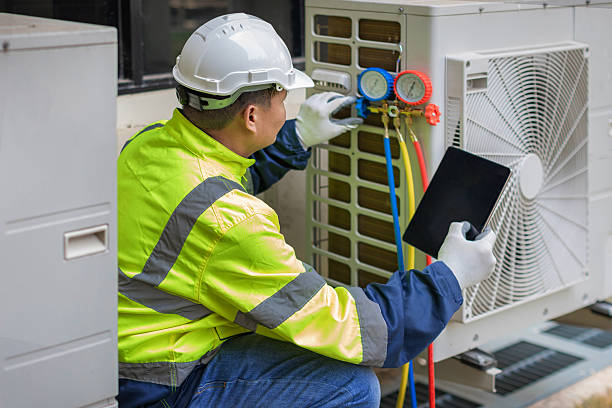 Professional Air Conditioning Repair technician working in USA
